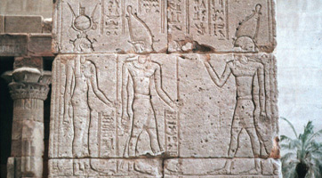 Deities carved in the wall of an Egyptian temple