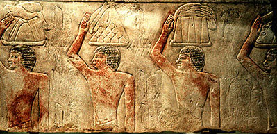 Egyptian slaves serving food